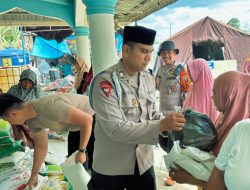 Berbagi Menyatukan Brimob dan Warga Aek Ngadol di Bulan Ramadhan